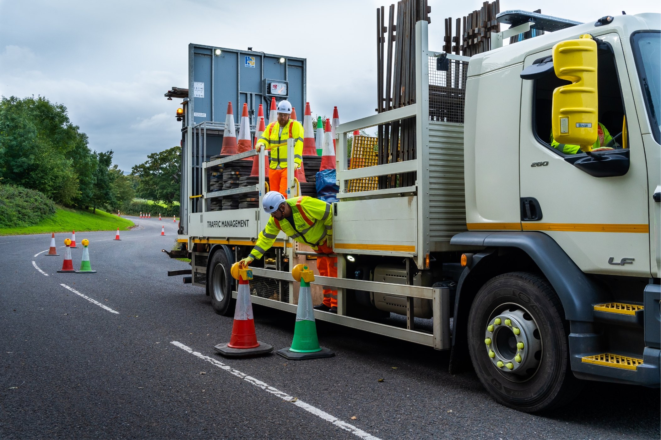 Traffic Management truck laying down temporary traffic cones - Core Highways